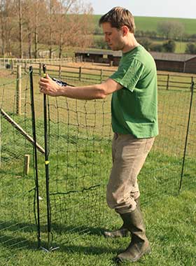 Setting up Omlet Chicken Netting.